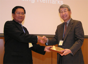 Incoming Pres. Prof. Dr. Shigeru Morichi receives an award from outgoing Pres. Dr. Primitivo Cal for his contribution to the society